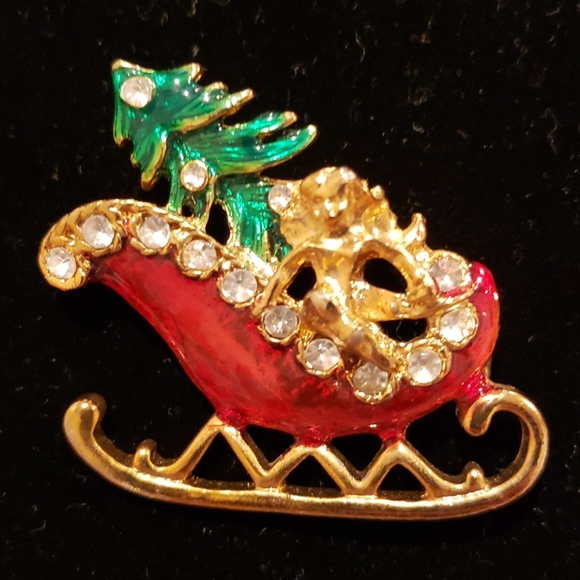 Vintage enamel Christmas sled angel by H-26